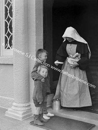 SISTER CORA (MT STANNE'S MILLTOWN),WITH POOR CHILDREN